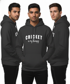 Three men wearing black hoodies with 'CRICKET is my therapy' text on a white background